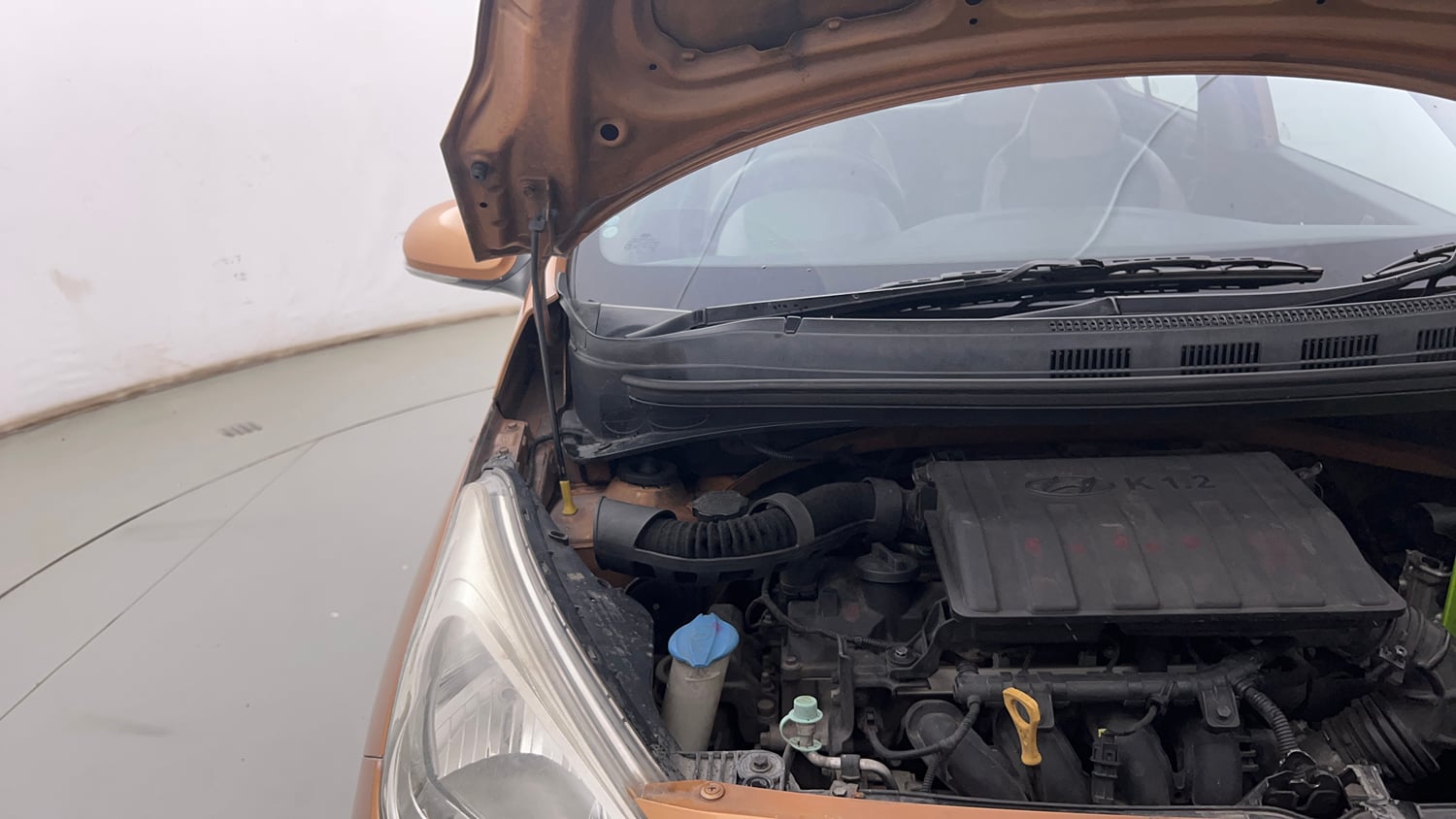 Used 2014 Hyundai Grand i10 Sportz 1.2 Kappa VTVT Petrol Manual engine ENGINE RIGHT SIDE HINGE & APRON VIEW