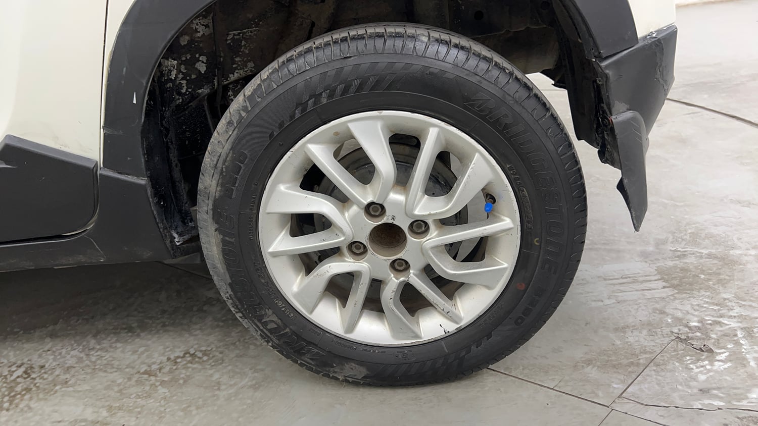 Used 2017 Mahindra KUV100 K6 D 6 STR Diesel Manual tyres LEFT REAR TYRE RIM VIEW