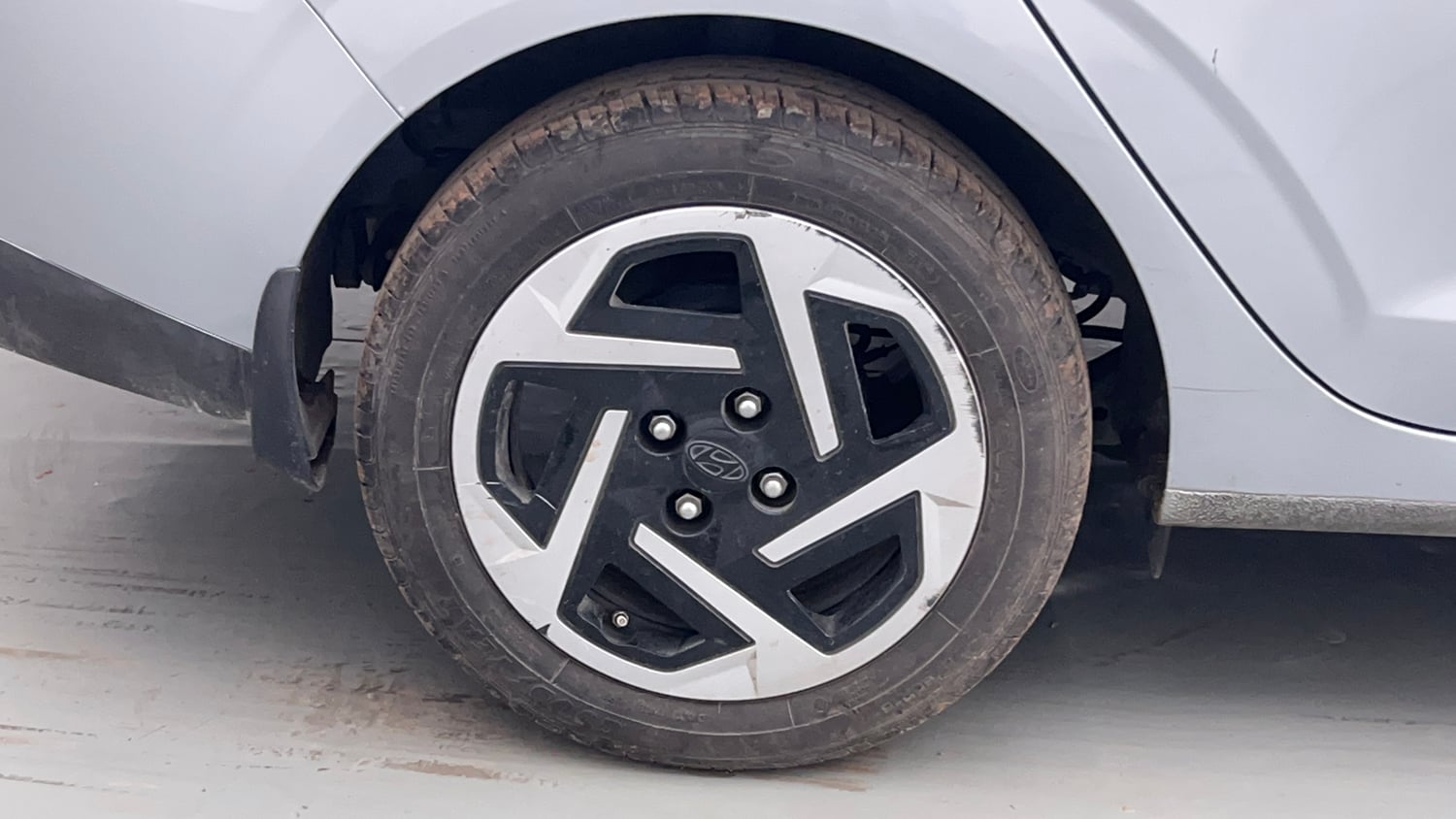 Used 2023 Hyundai Aura S 1.2 Petrol Petrol Manual tyres RIGHT REAR TYRE RIM VIEW