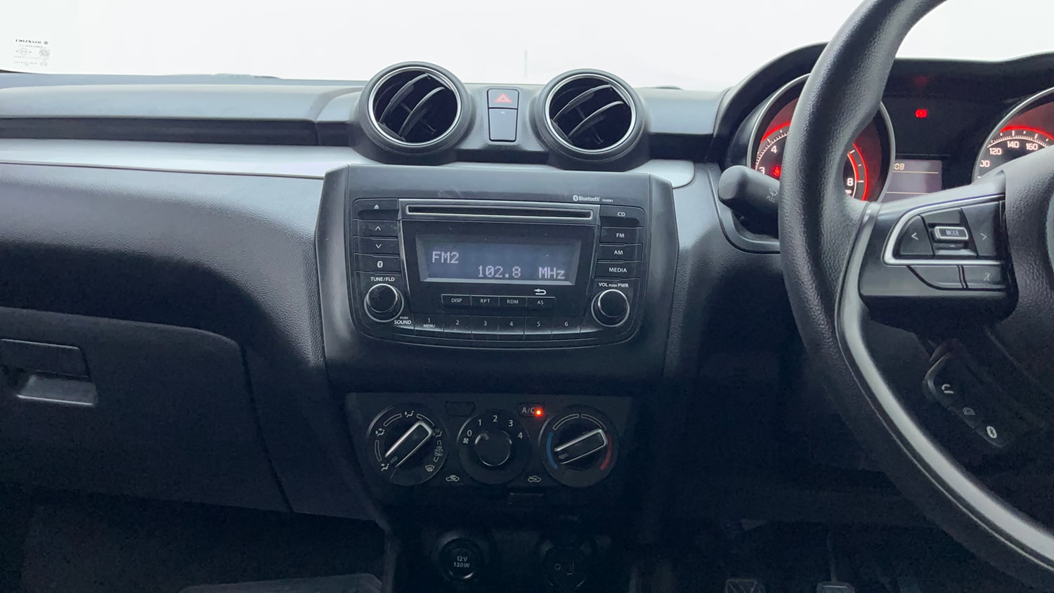 Used 2019 Maruti Suzuki Swift VXi Petrol Manual interior MUSIC SYSTEM & AC CONTROL VIEW