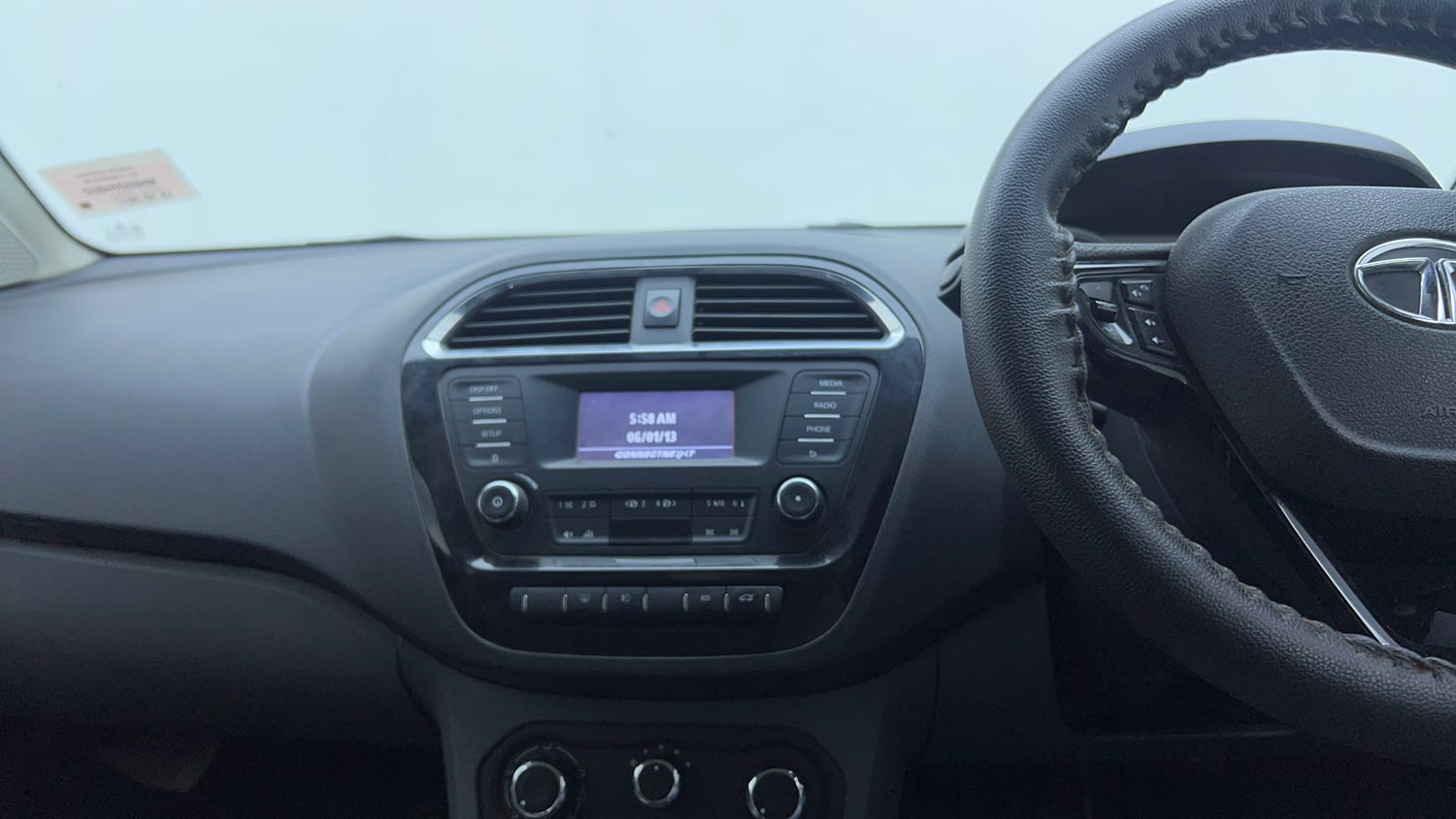 Used 2017 Tata Tigor Revotorq XZ Diesel Manual top_features Integrated (in-dash) music system