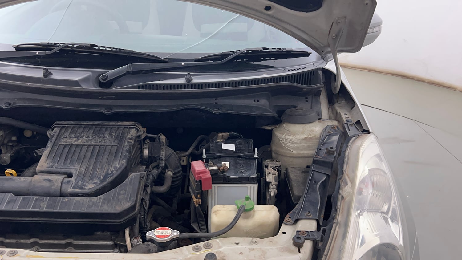 Used 2012 Maruti Suzuki Swift Dzire VXI Petrol Manual engine ENGINE LEFT SIDE HINGE & APRON VIEW