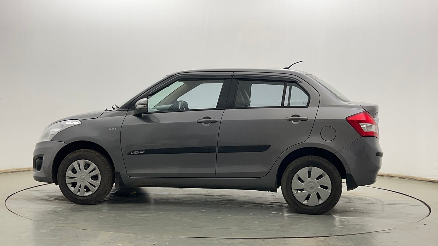 Used 2014 Maruti Suzuki Swift Dzire VXI Petrol Manual exterior LEFT SIDE VIEW