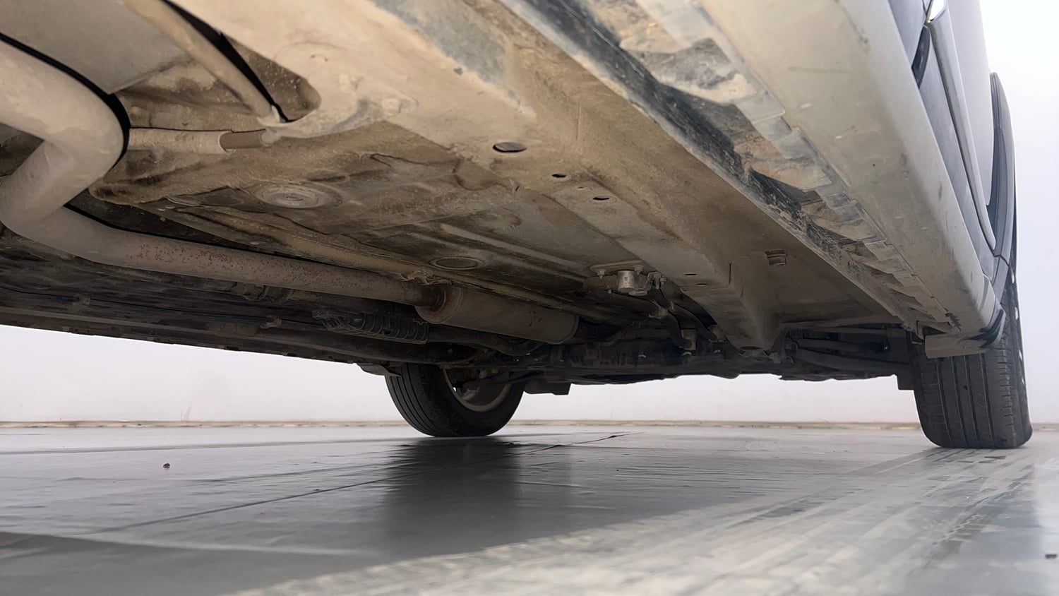 Used 2022 Maruti Suzuki XL6 Alpha Plus AT Petrol Petrol Automatic extra REAR RIGHT UNDERBODY VIEW