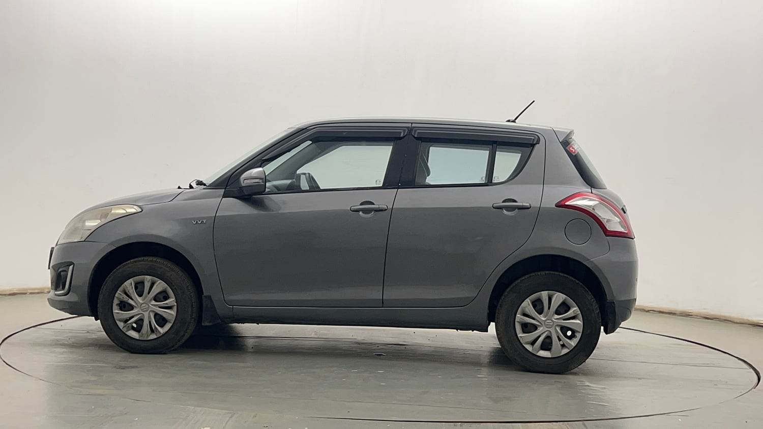 Used 2015 Maruti Suzuki Swift VXi Petrol Manual exterior LEFT SIDE VIEW