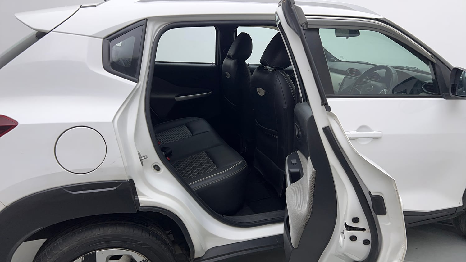 Used 2022 Nissan Magnite XE Petrol Manual interior RIGHT SIDE REAR DOOR CABIN VIEW