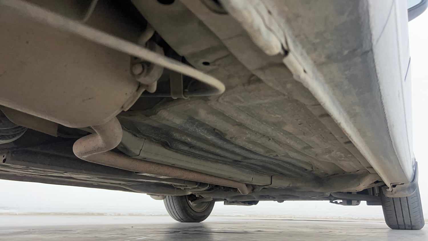 Used 2022 Honda Amaze VX CVT 1.2 Petrol Petrol Automatic extra REAR RIGHT UNDERBODY VIEW