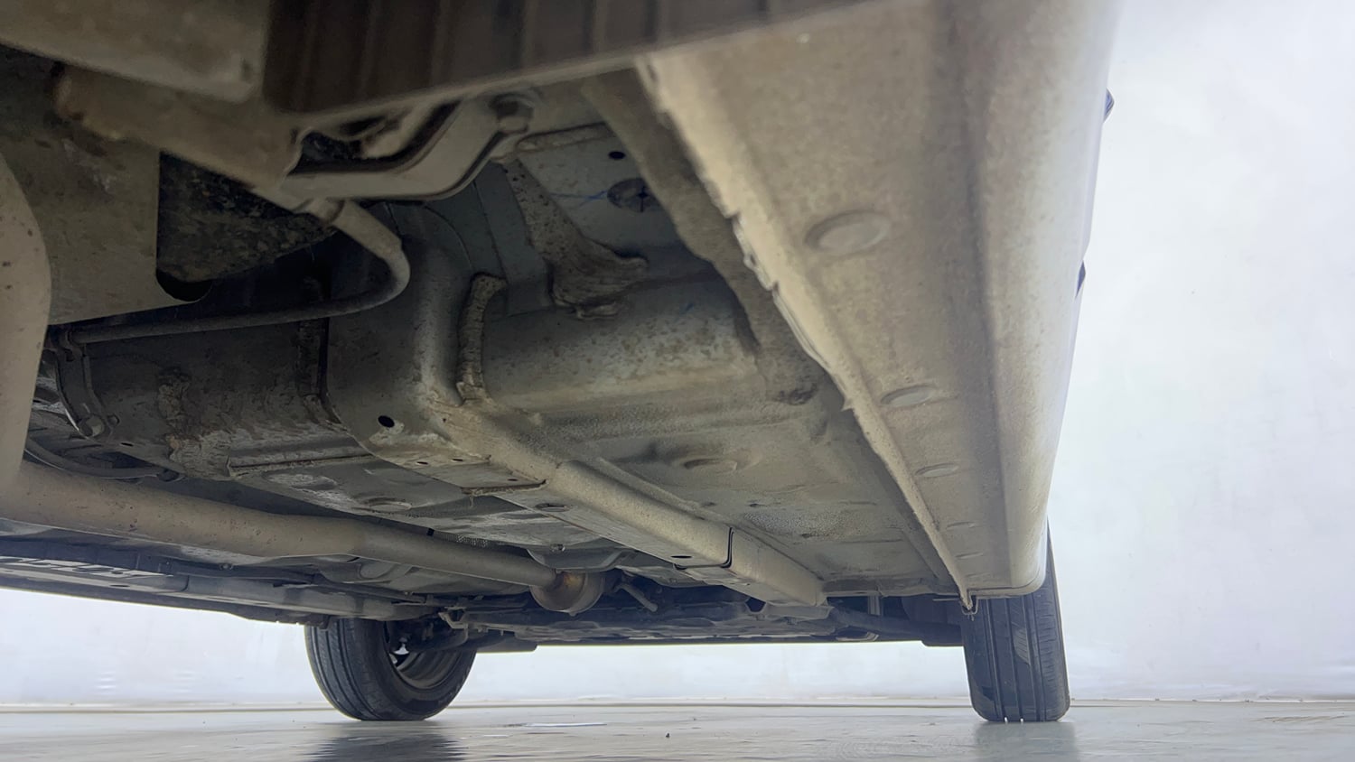 Used 2025 Hyundai Aura S 1.2 Petrol Petrol Manual extra REAR RIGHT UNDERBODY VIEW