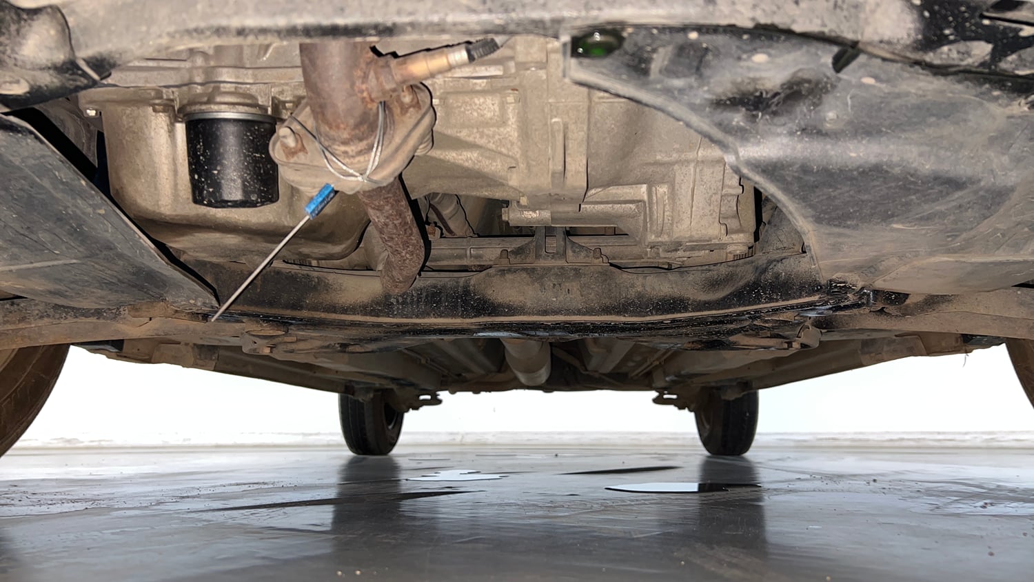 Used 2015 Maruti Suzuki Swift VXi Petrol Manual extra FRONT LEFT UNDERBODY VIEW
