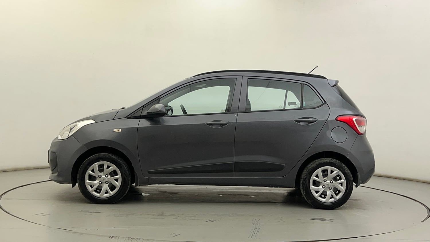 Used 2019 Hyundai Grand i10 Magna 1.2 Kappa VTVT Petrol Manual exterior LEFT SIDE VIEW