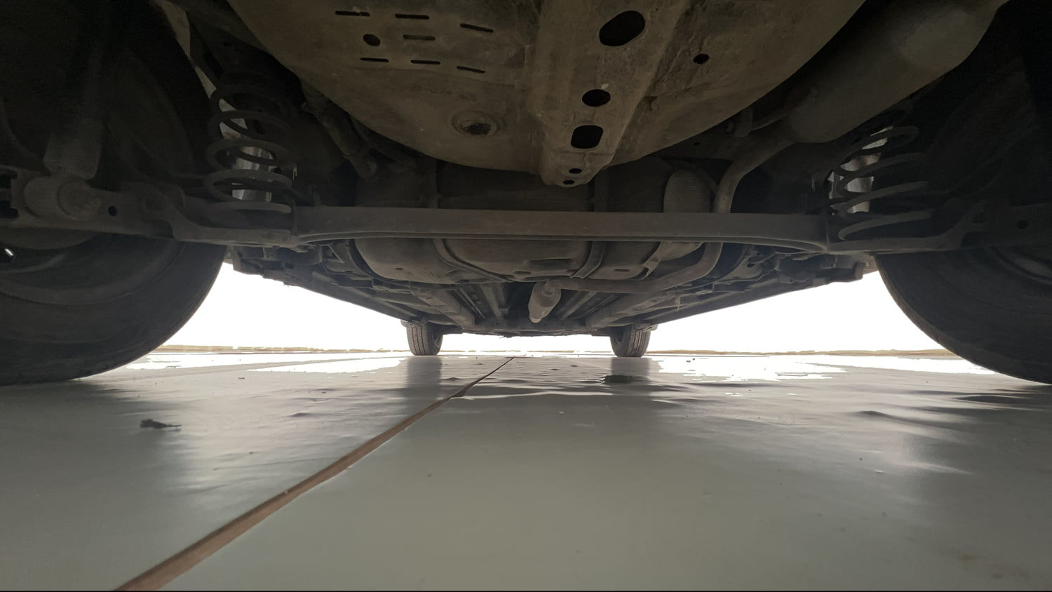Used 2015 Maruti Suzuki Swift VXi Petrol Manual extra REAR UNDERBODY VIEW (TAKEN FROM REAR)