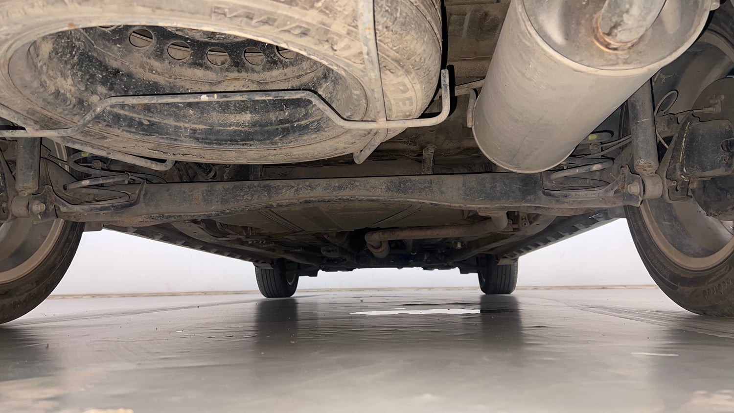 Used 2022 Maruti Suzuki XL6 Alpha Plus AT Petrol Petrol Automatic extra REAR UNDERBODY VIEW (TAKEN FROM REAR)