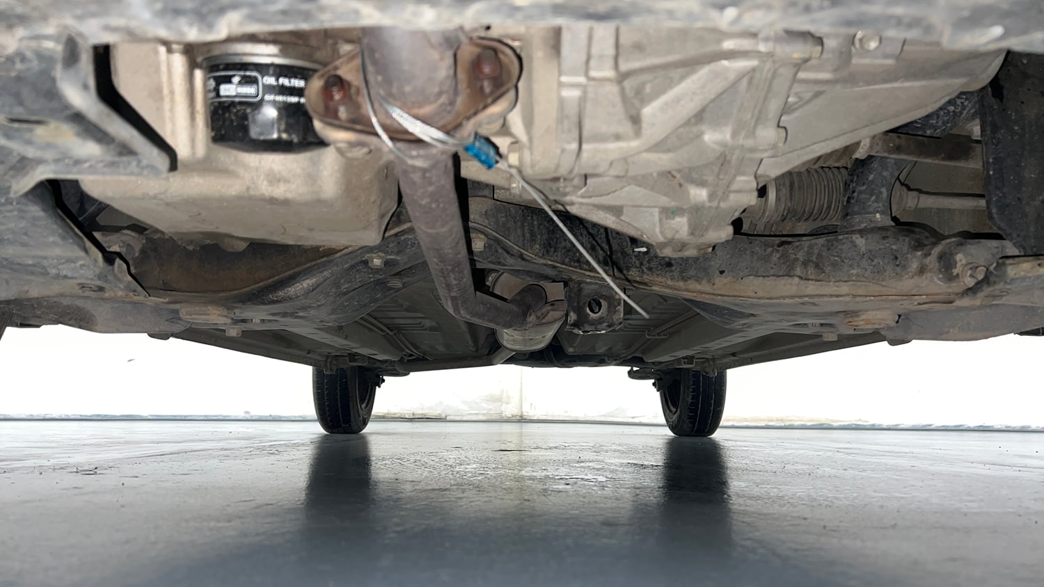 Used 2014 Maruti Suzuki Celerio VXi AMT Petrol Automatic extra FRONT LEFT UNDERBODY VIEW
