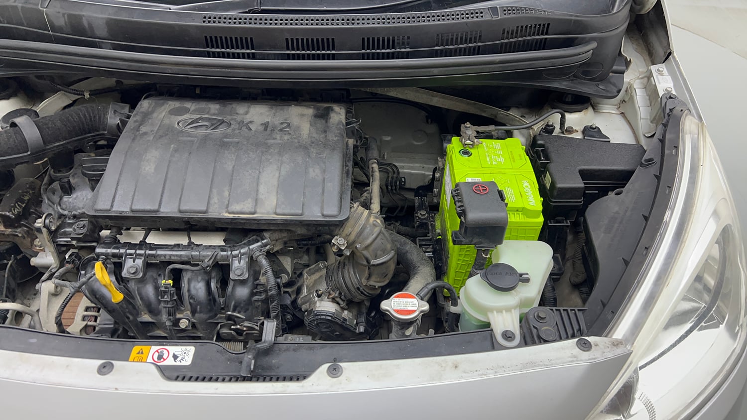 Used 2013 Hyundai Grand i10 Magna 1.2 Kappa VTVT Petrol Manual engine ENGINE LEFT SIDE VIEW