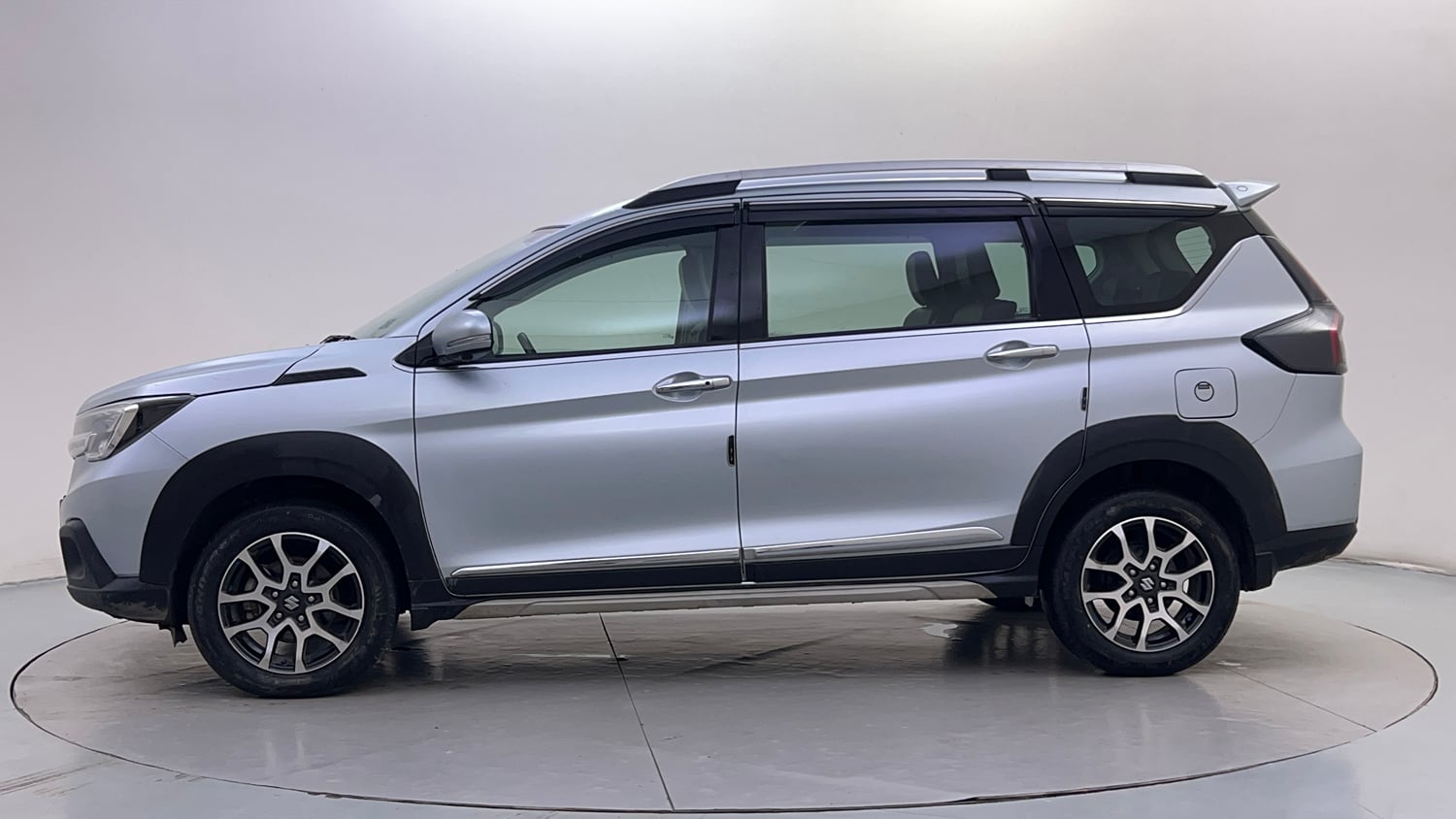 Used 2023 Maruti Suzuki XL6 Alpha MT Petrol Petrol Manual exterior LEFT SIDE VIEW