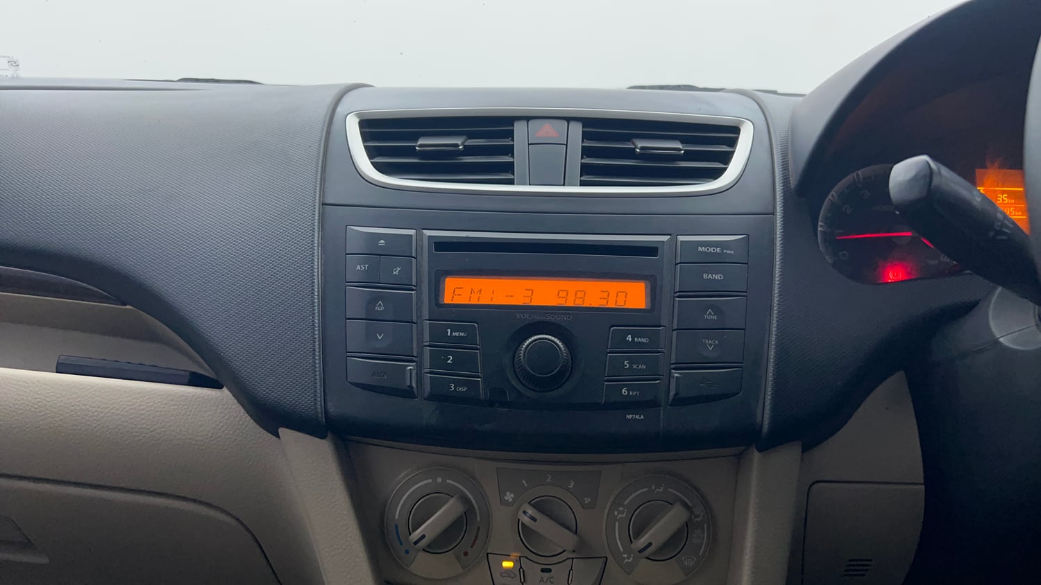 Used 2012 Maruti Suzuki Swift Dzire VXI Petrol Manual interior MUSIC SYSTEM & AC CONTROL VIEW