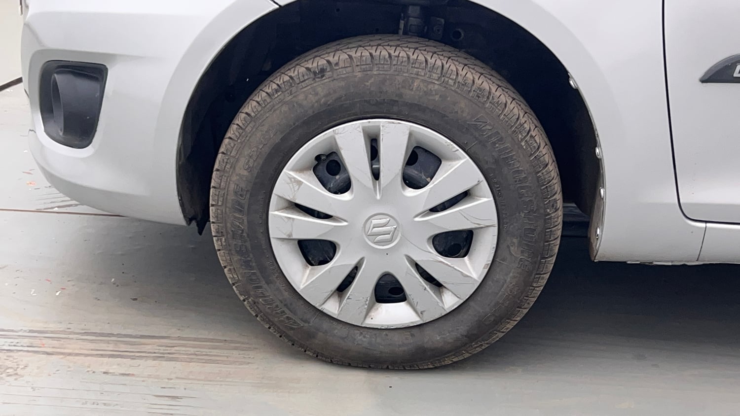 Used 2012 Maruti Suzuki Swift Dzire VXI Petrol Manual tyres LEFT FRONT TYRE RIM VIEW