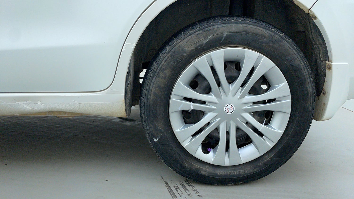 Used 2013 Maruti Suzuki Ertiga Vxi Petrol Manual tyres LEFT REAR TYRE RIM VIEW