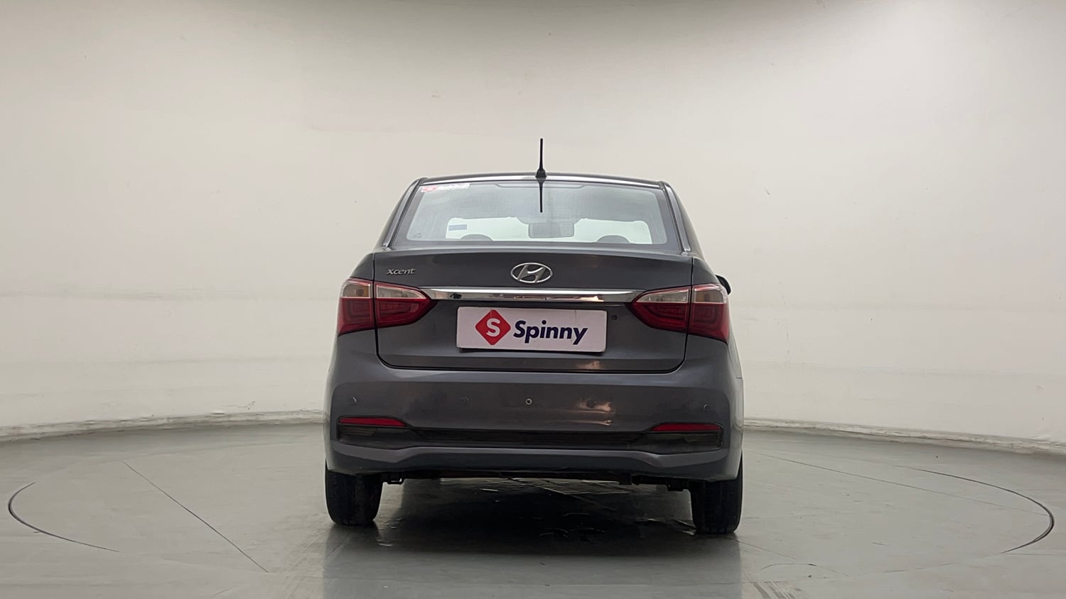 Used 2018 Hyundai Xcent E+ CNG (Outside Fitted) Cng Manual exterior BACK VIEW