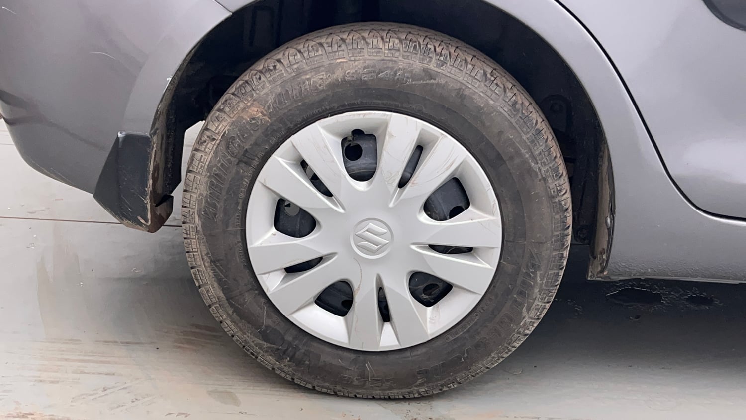 Used 2014 Maruti Suzuki Swift Dzire VXI Petrol Manual tyres RIGHT REAR TYRE RIM VIEW