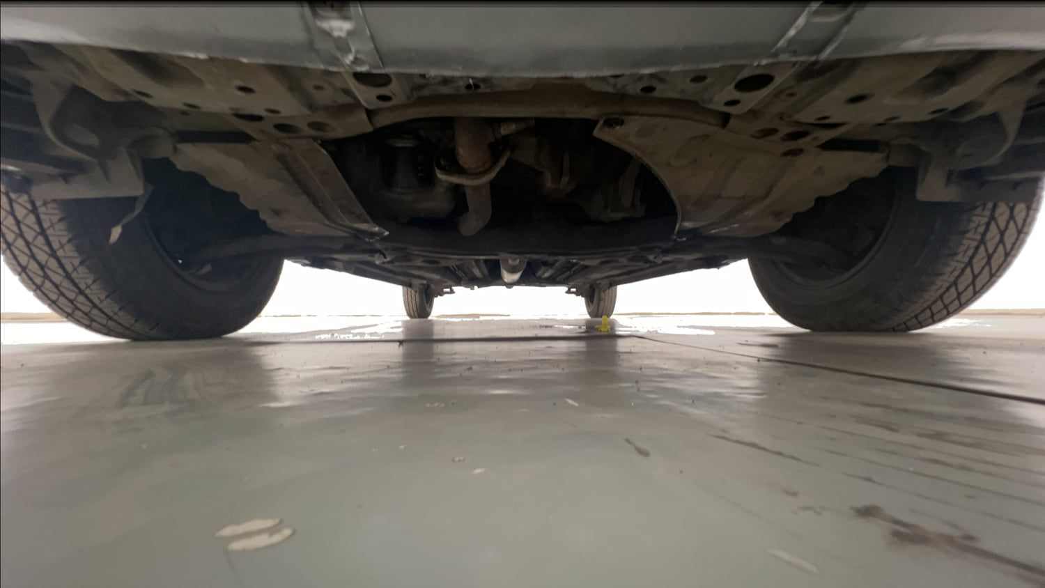 Used 2012 Maruti Suzuki Swift Dzire VXI Petrol Manual extra FRONT LEFT UNDERBODY VIEW