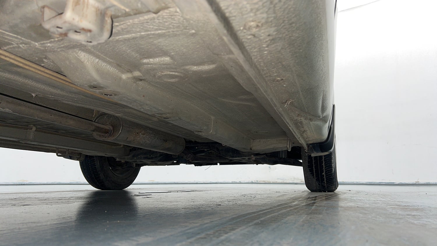 Used 2014 Maruti Suzuki Celerio VXi AMT Petrol Automatic extra REAR RIGHT UNDERBODY VIEW