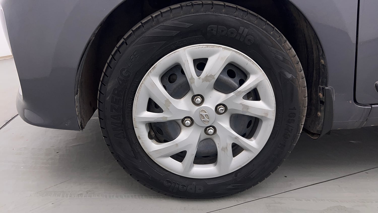 Used 2019 Hyundai Grand i10 Sportz 1.2 Kappa VTVT Petrol Manual tyres LEFT FRONT TYRE RIM VIEW