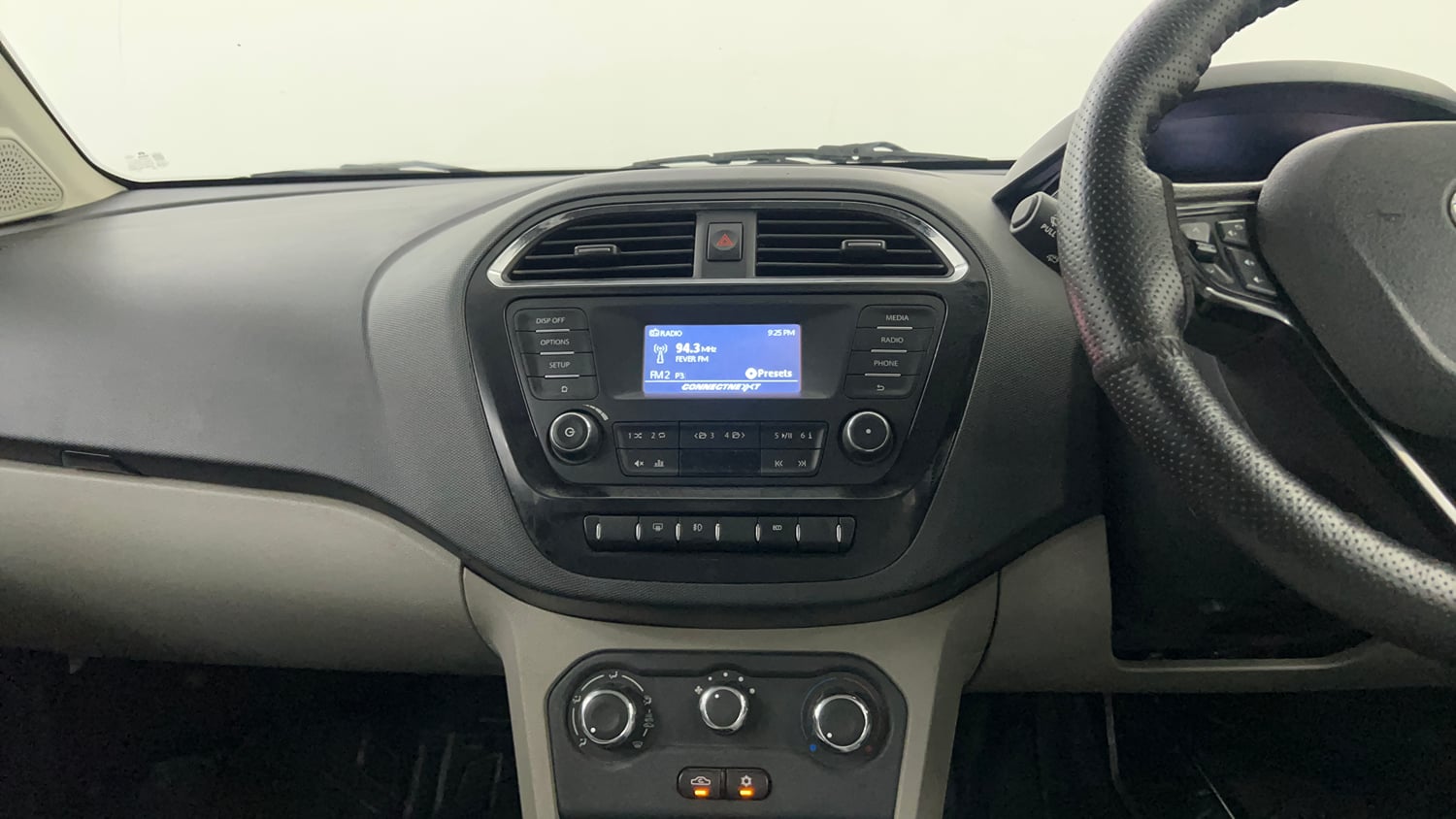 Used 2018 Tata Tiago Revotron XZ Petrol Manual interior MUSIC SYSTEM & AC CONTROL VIEW