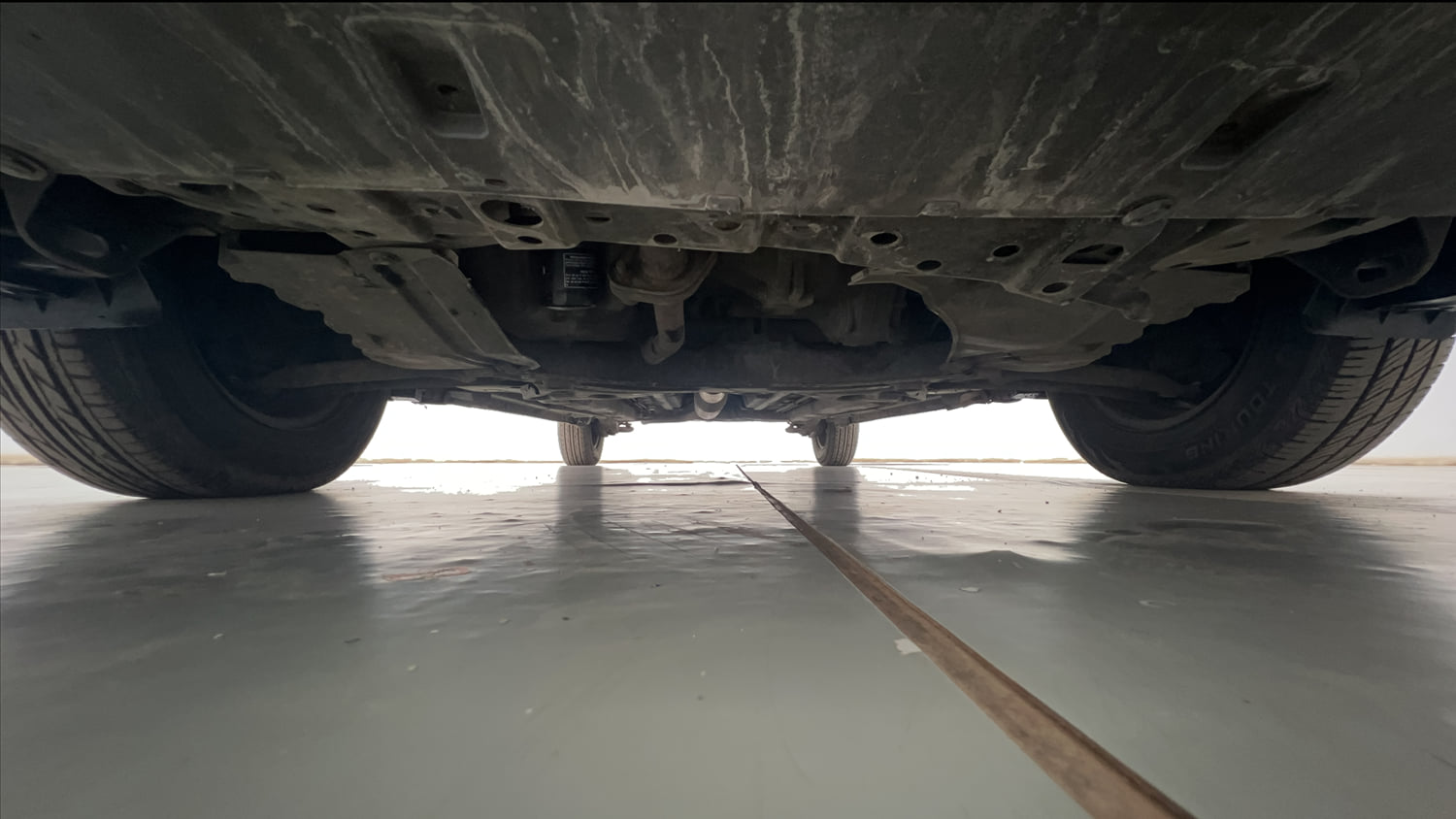 Used 2015 Maruti Suzuki Swift VXi Petrol Manual extra FRONT LEFT UNDERBODY VIEW