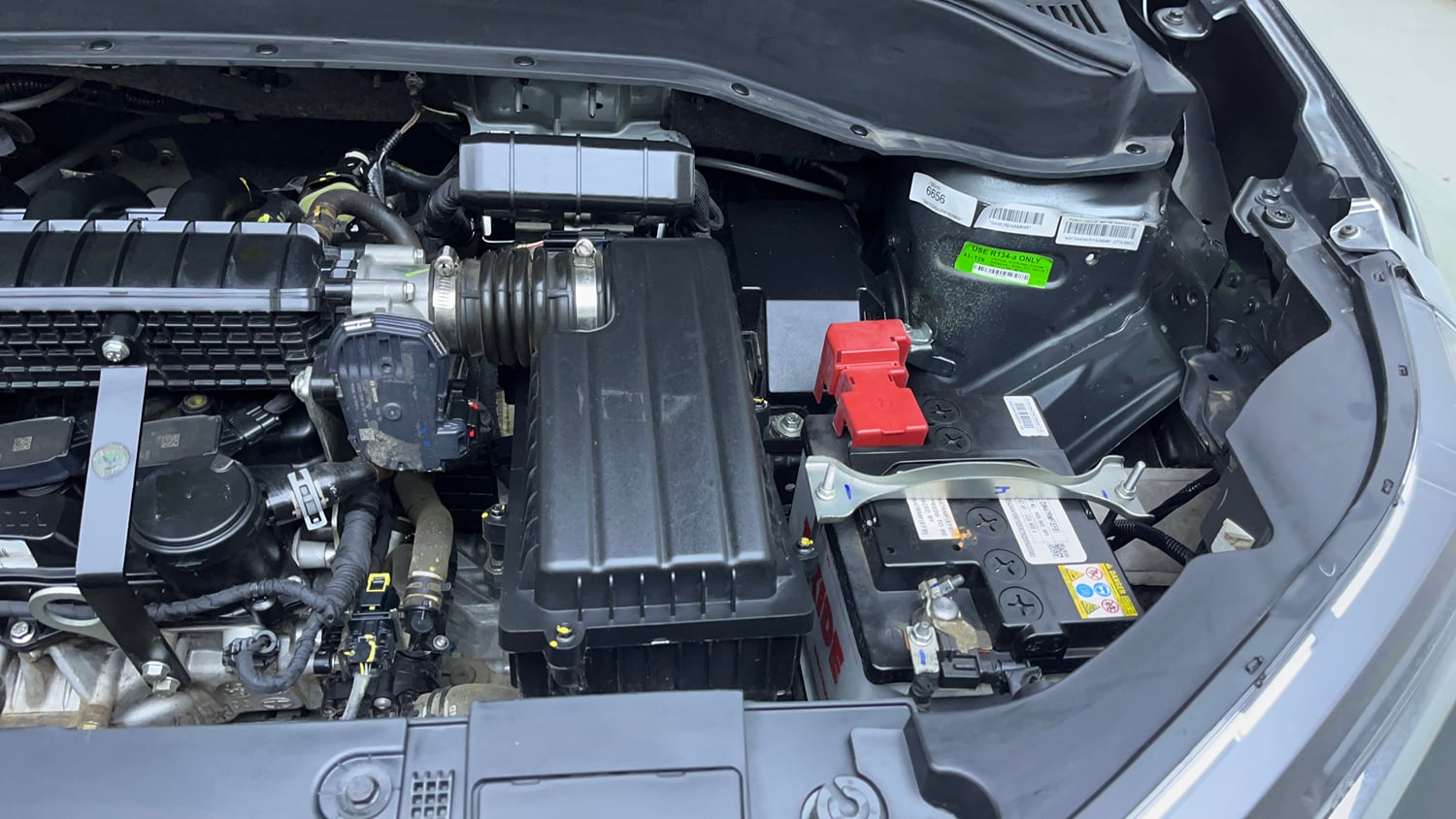 Used 2024 Tata Punch Creative Dual Tone AMT Petrol Automatic engine ENGINE LEFT SIDE VIEW