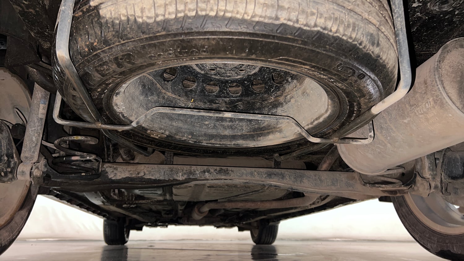Used 2023 Maruti Suzuki XL6 Alpha MT Petrol Petrol Manual extra REAR UNDERBODY VIEW (TAKEN FROM REAR)