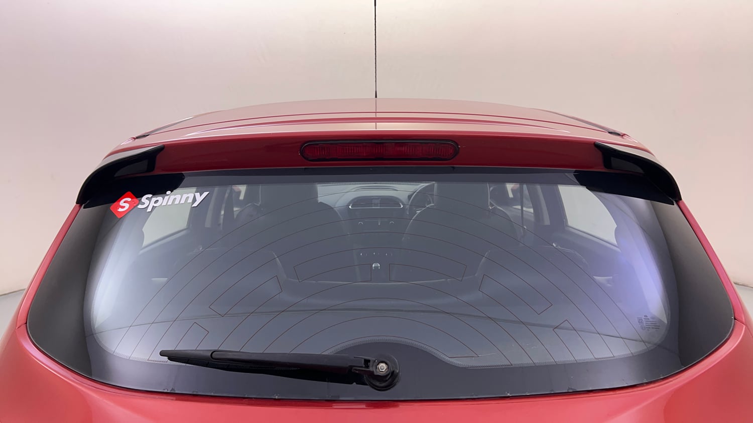 Used 2016 Tata Tiago Revotron XZ w/o Alloy Petrol Manual top_features Rear defogger