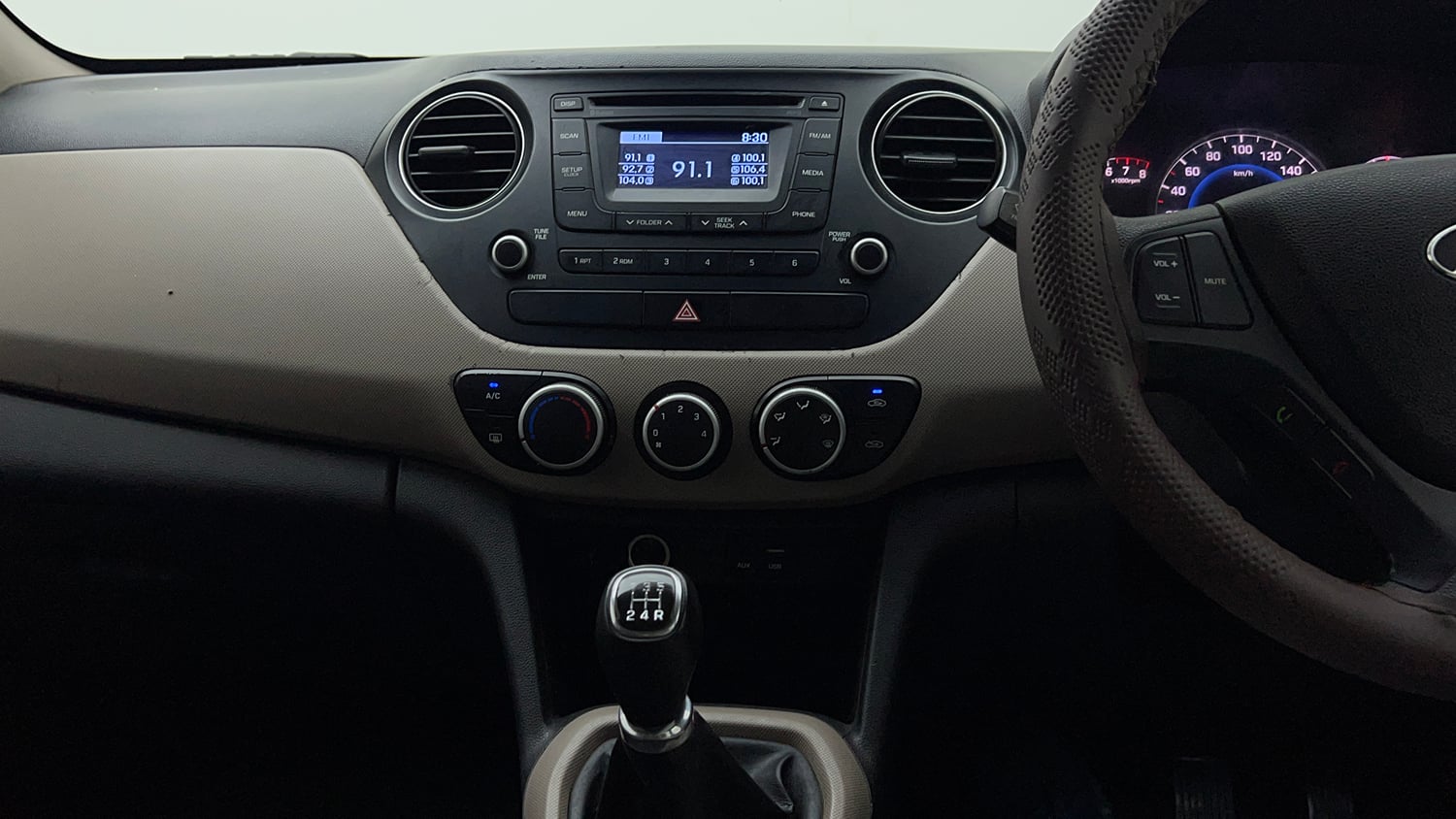 Used 2015 Hyundai Grand i10 Sportz 1.2 Kappa VTVT Petrol Manual interior MUSIC SYSTEM & AC CONTROL VIEW