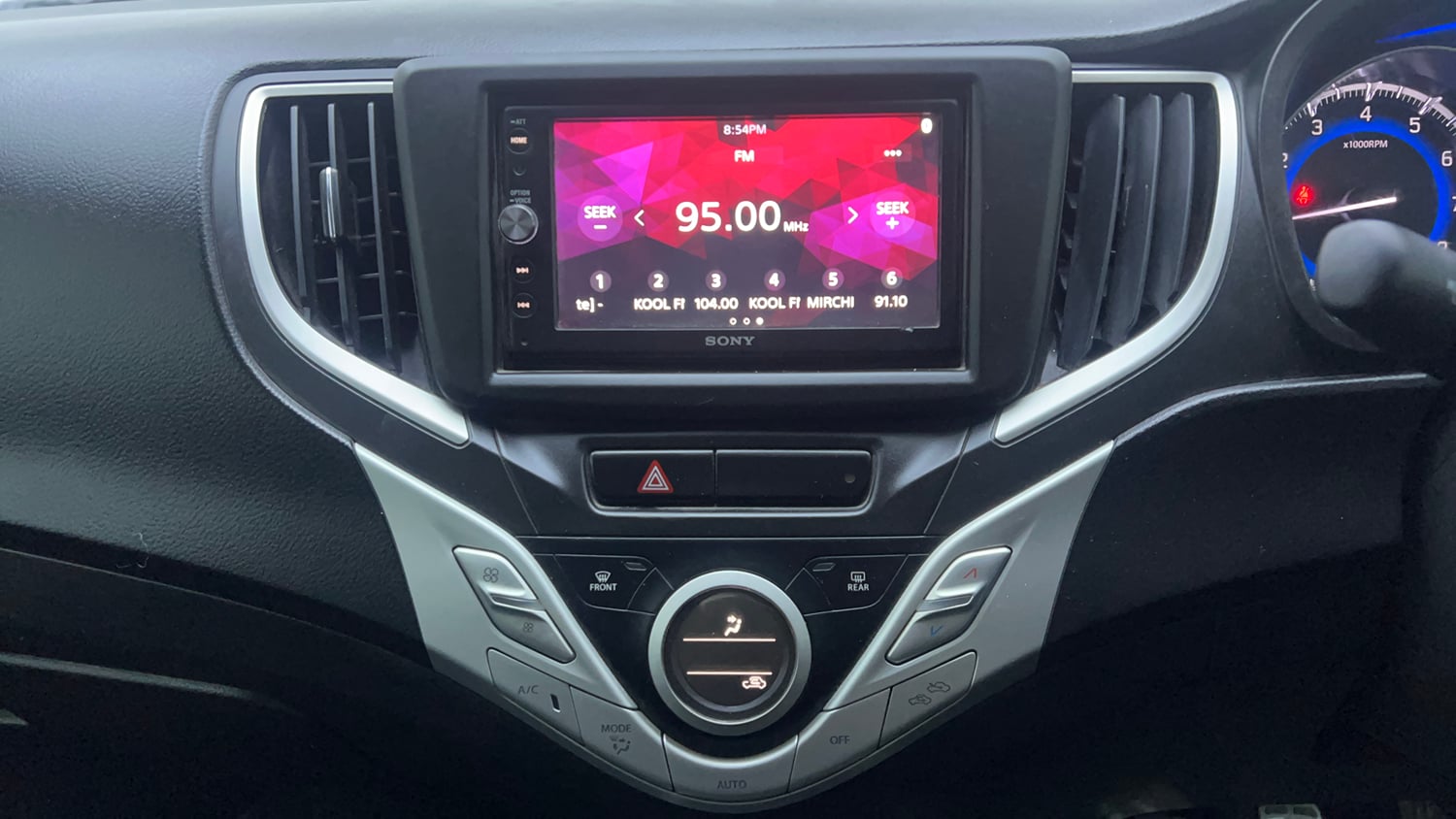 Used 2017 Maruti Suzuki Baleno Zeta 1.2 Petrol Manual interior MUSIC SYSTEM & AC CONTROL VIEW