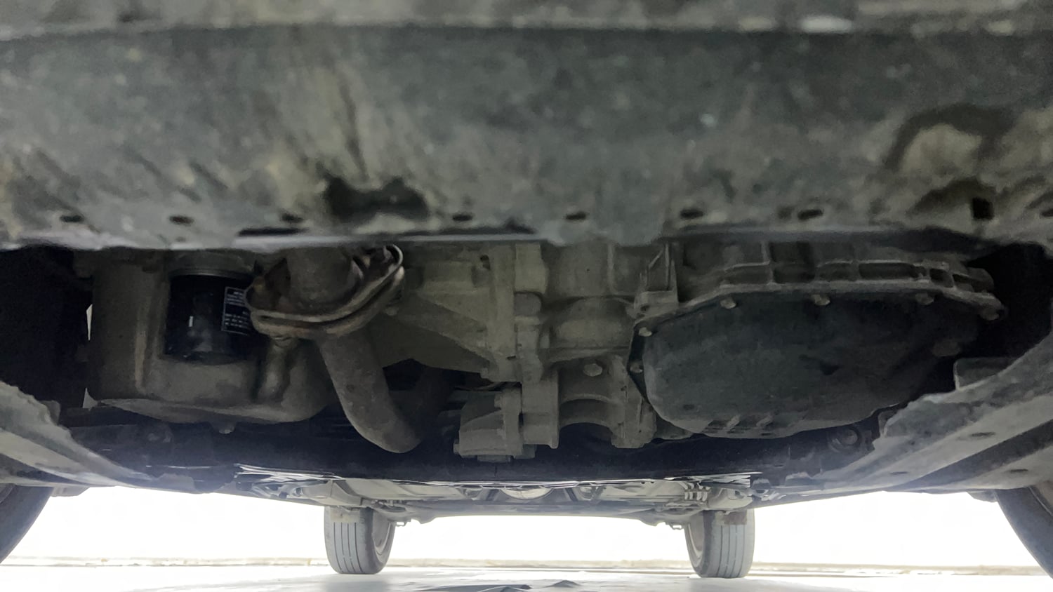 Used 2020 Maruti Suzuki Baleno Zeta Automatic Petrol Automatic extra FRONT LEFT UNDERBODY VIEW