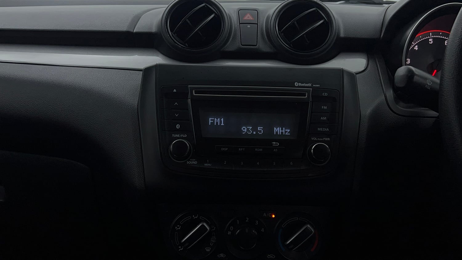 Used 2020 Maruti Suzuki Swift VXi Petrol Manual top_features Integrated (in-dash) music system