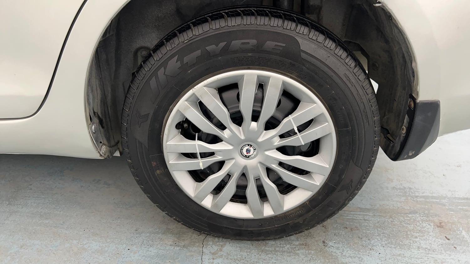 Used 2015 Maruti Suzuki Swift Dzire VXI Petrol Manual tyres LEFT REAR TYRE RIM VIEW