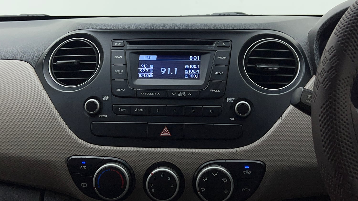 Used 2015 Hyundai Grand i10 Sportz 1.2 Kappa VTVT Petrol Manual top_features Integrated (in-dash) music system
