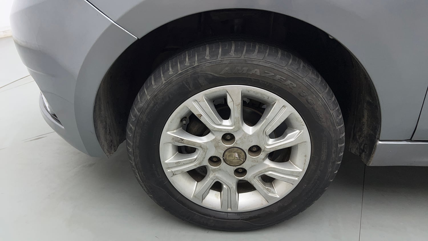 Used 2018 Tata Tiago Revotron XZ Petrol Manual tyres LEFT FRONT TYRE RIM VIEW
