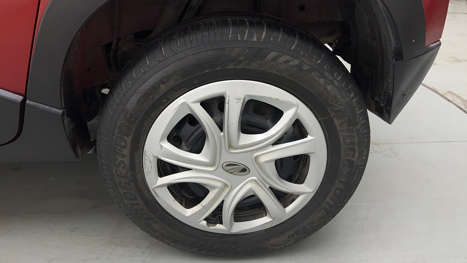 Used 2016 Mahindra KUV100 K6+ 6 STR Petrol Manual tyres LEFT REAR TYRE RIM VIEW