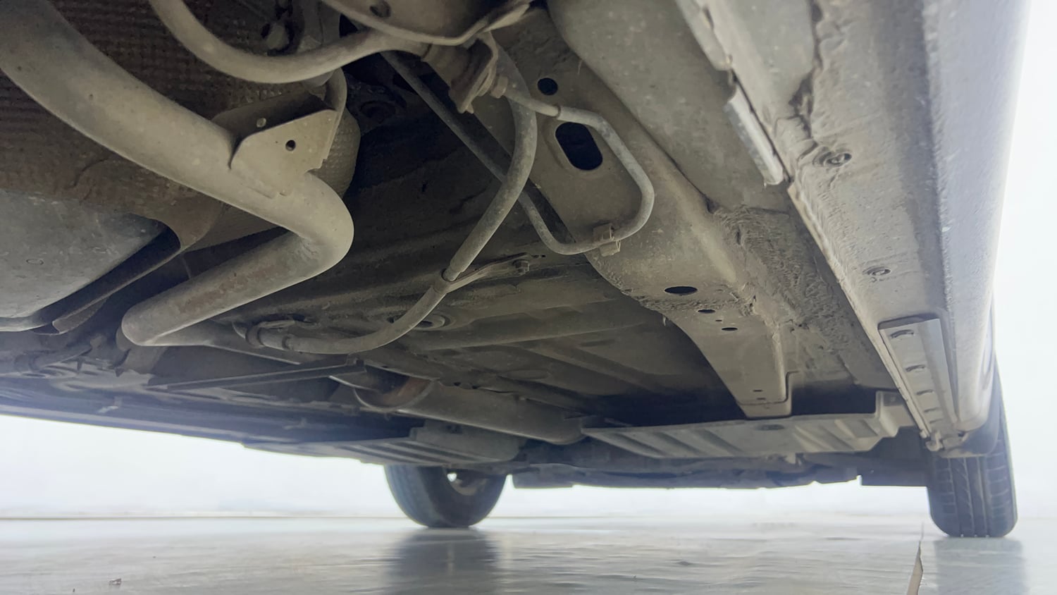 Used 2020 Maruti Suzuki Dzire VXi AGS Petrol Automatic extra REAR RIGHT UNDERBODY VIEW