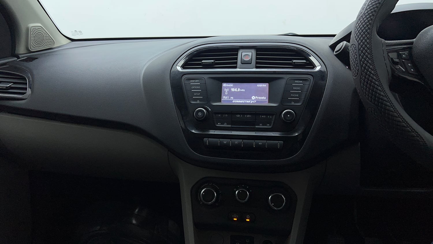 Used 2018 Tata Tiago Revotron XZ Petrol Manual interior MUSIC SYSTEM & AC CONTROL VIEW