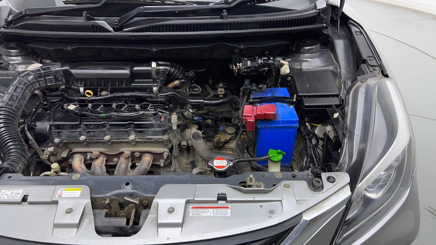 Used 2019 Maruti Suzuki Baleno Delta Petrol Manual engine ENGINE LEFT SIDE VIEW