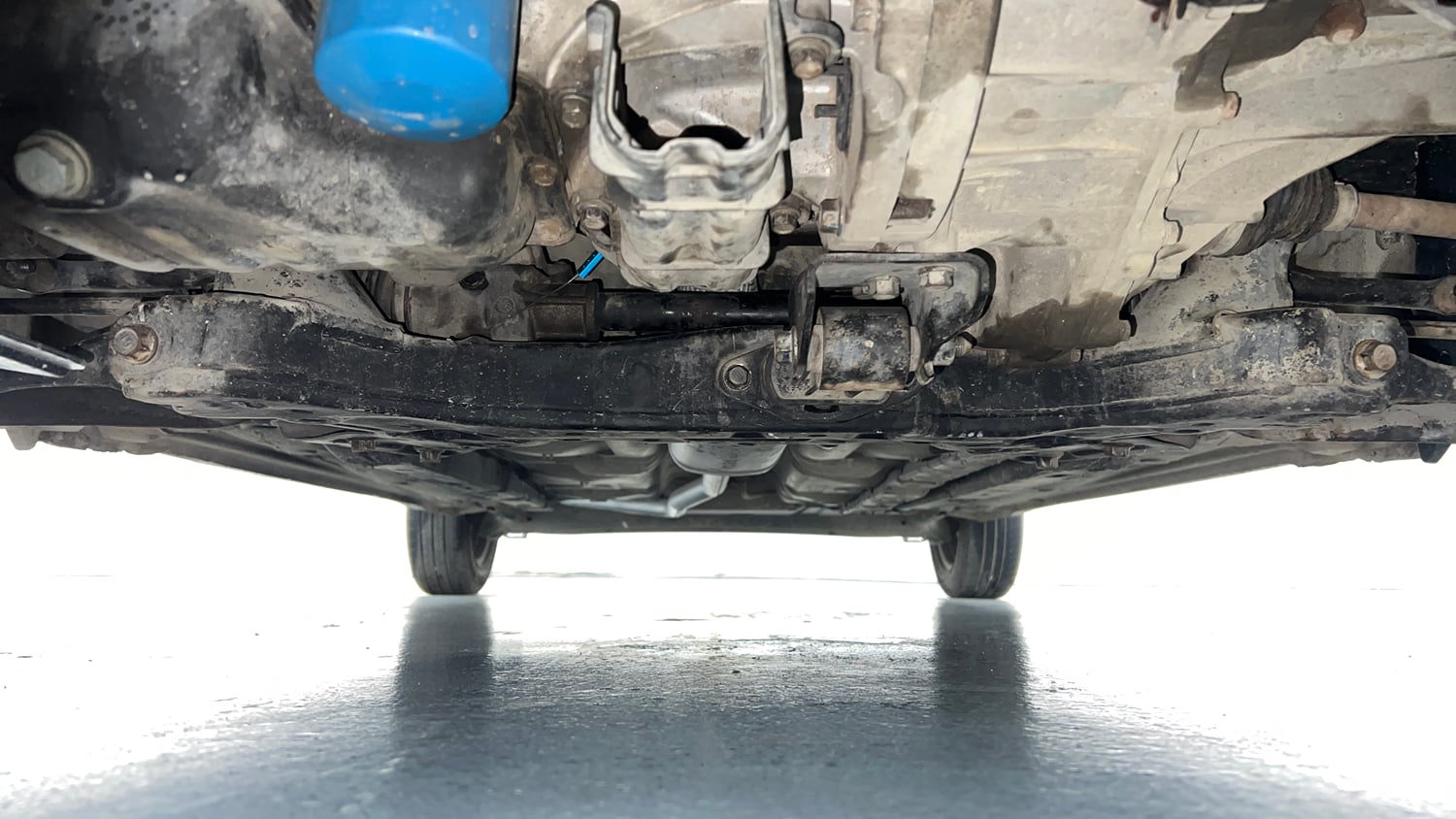 Used 2015 Hyundai Grand i10 Sportz 1.2 Kappa VTVT Petrol Manual extra FRONT LEFT UNDERBODY VIEW
