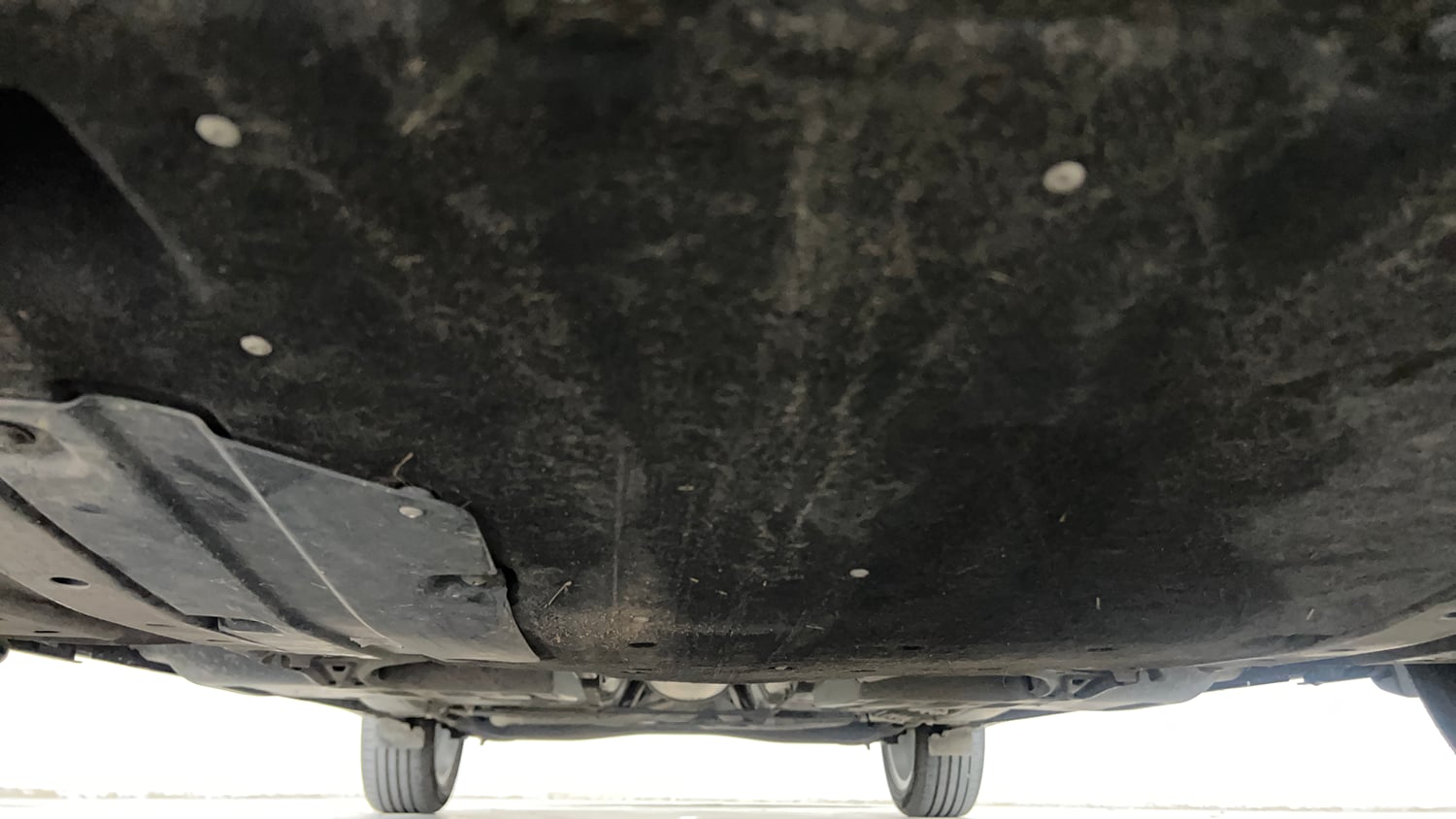 Used 2024 Maruti Suzuki Baleno Zeta MT CNG Cng Manual extra FRONT LEFT UNDERBODY VIEW