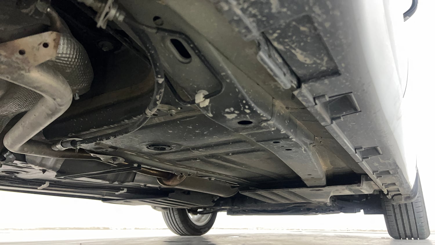 Used 2024 Maruti Suzuki Baleno Zeta MT CNG Cng Manual extra REAR RIGHT UNDERBODY VIEW