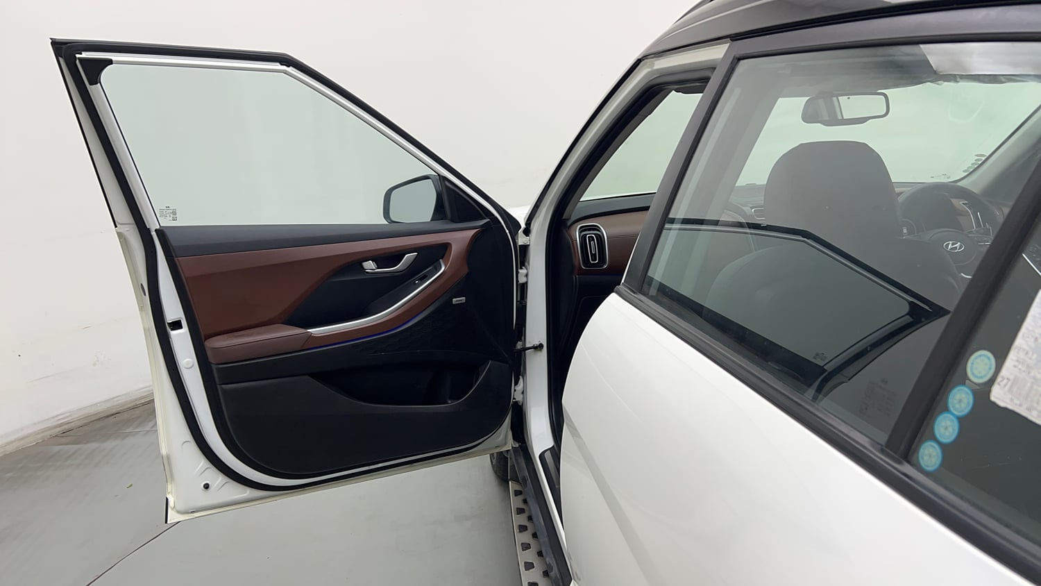 Used 2022 Hyundai Alcazar Signature (O) 6 STR 2.0 Petrol AT Dual Tone Petrol Automatic interior LEFT FRONT DOOR OPEN VIEW