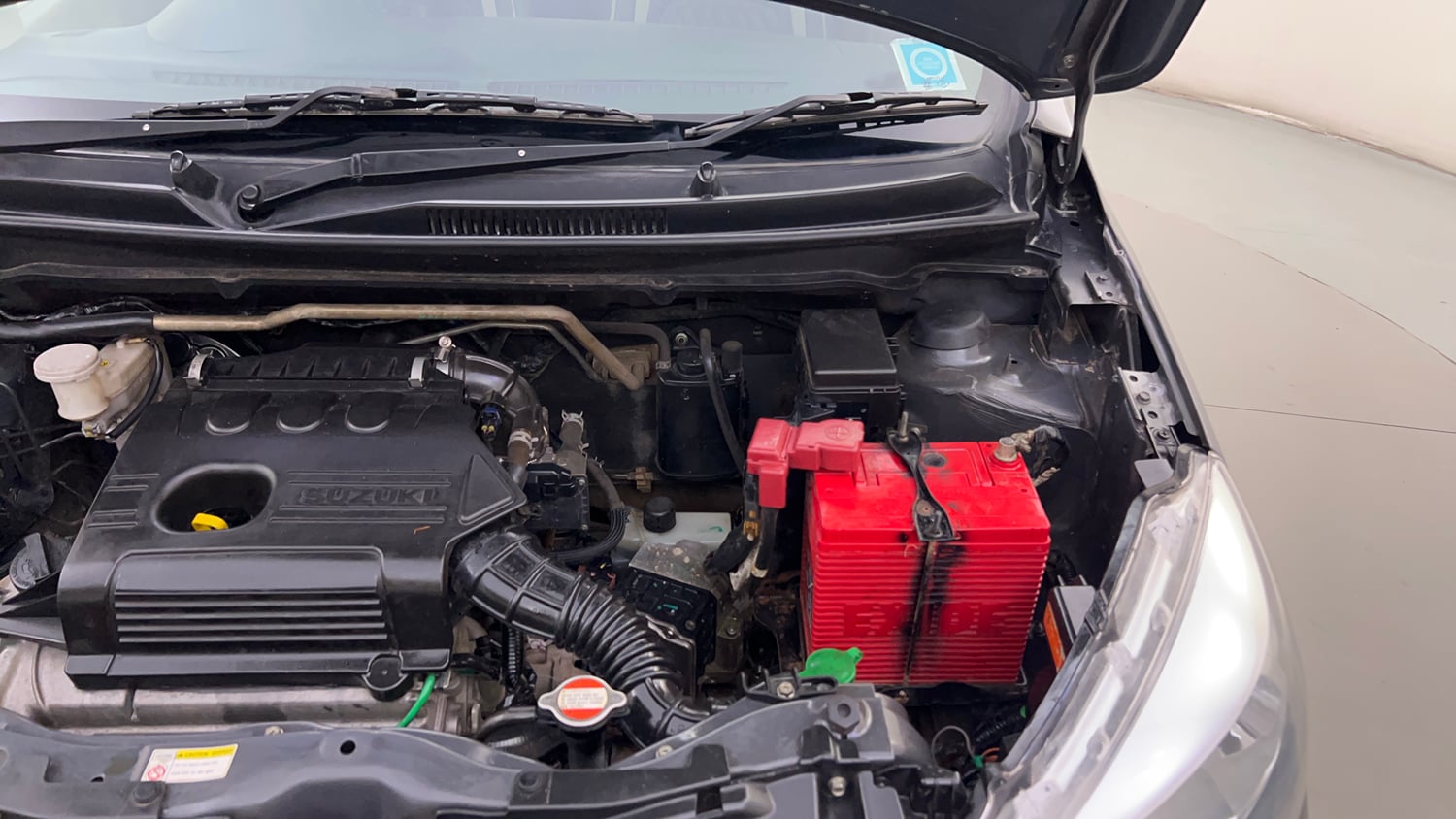 Used 2017 Maruti Suzuki Celerio ZXI (O) AMT Petrol Automatic engine ENGINE LEFT SIDE HINGE & APRON VIEW