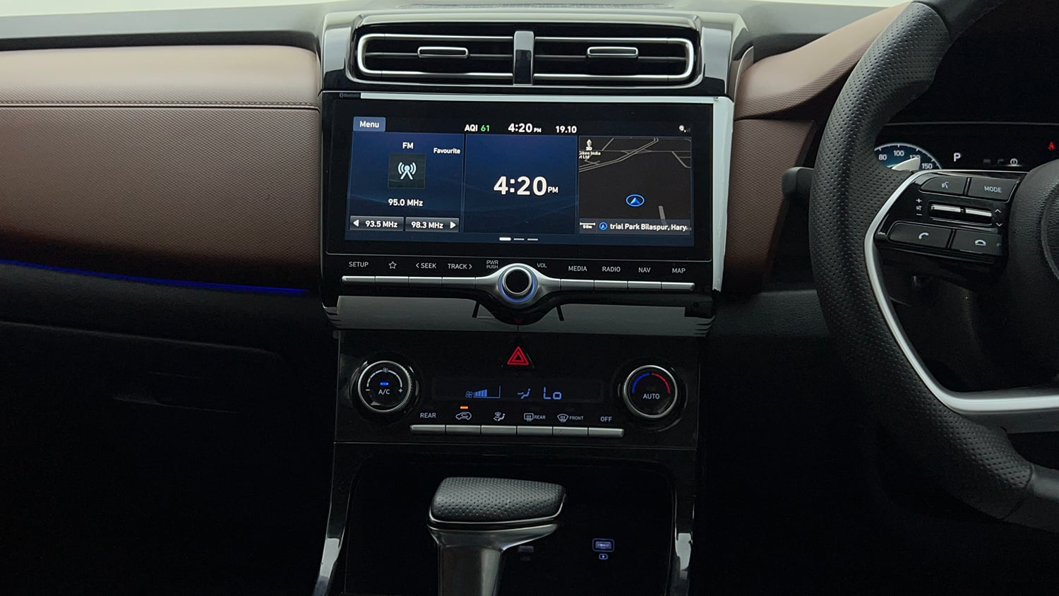 Used 2022 Hyundai Alcazar Signature (O) 6 STR 2.0 Petrol AT Dual Tone Petrol Automatic interior MUSIC SYSTEM & AC CONTROL VIEW