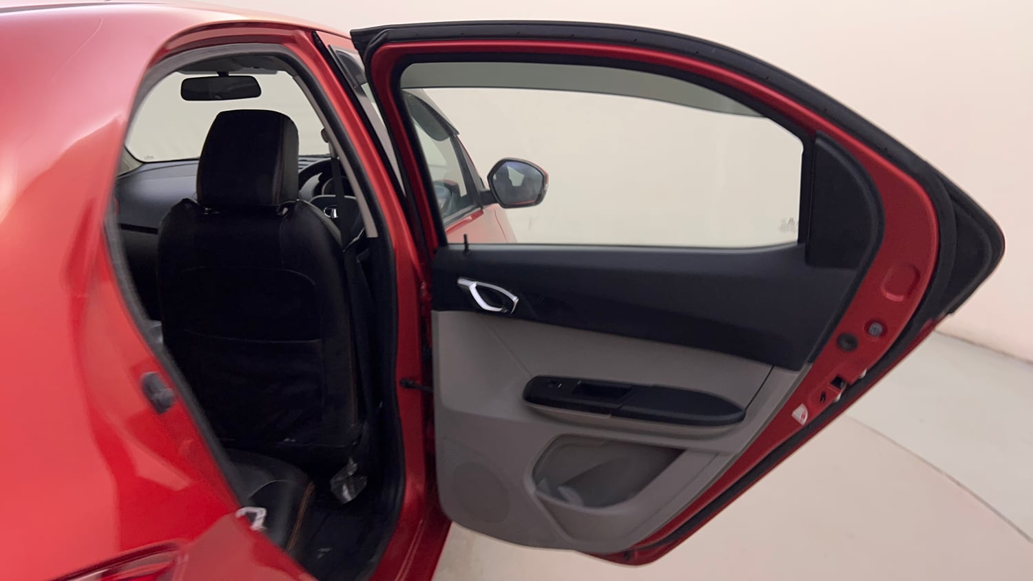 Used 2016 Tata Tiago Revotron XZ w/o Alloy Petrol Manual interior RIGHT REAR DOOR OPEN VIEW